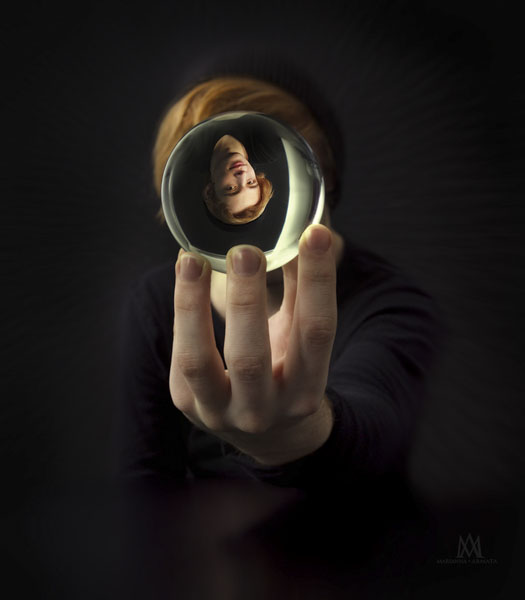 Photograph Marianna Armata Looking Through The Crystal Ball on One Eyeland
